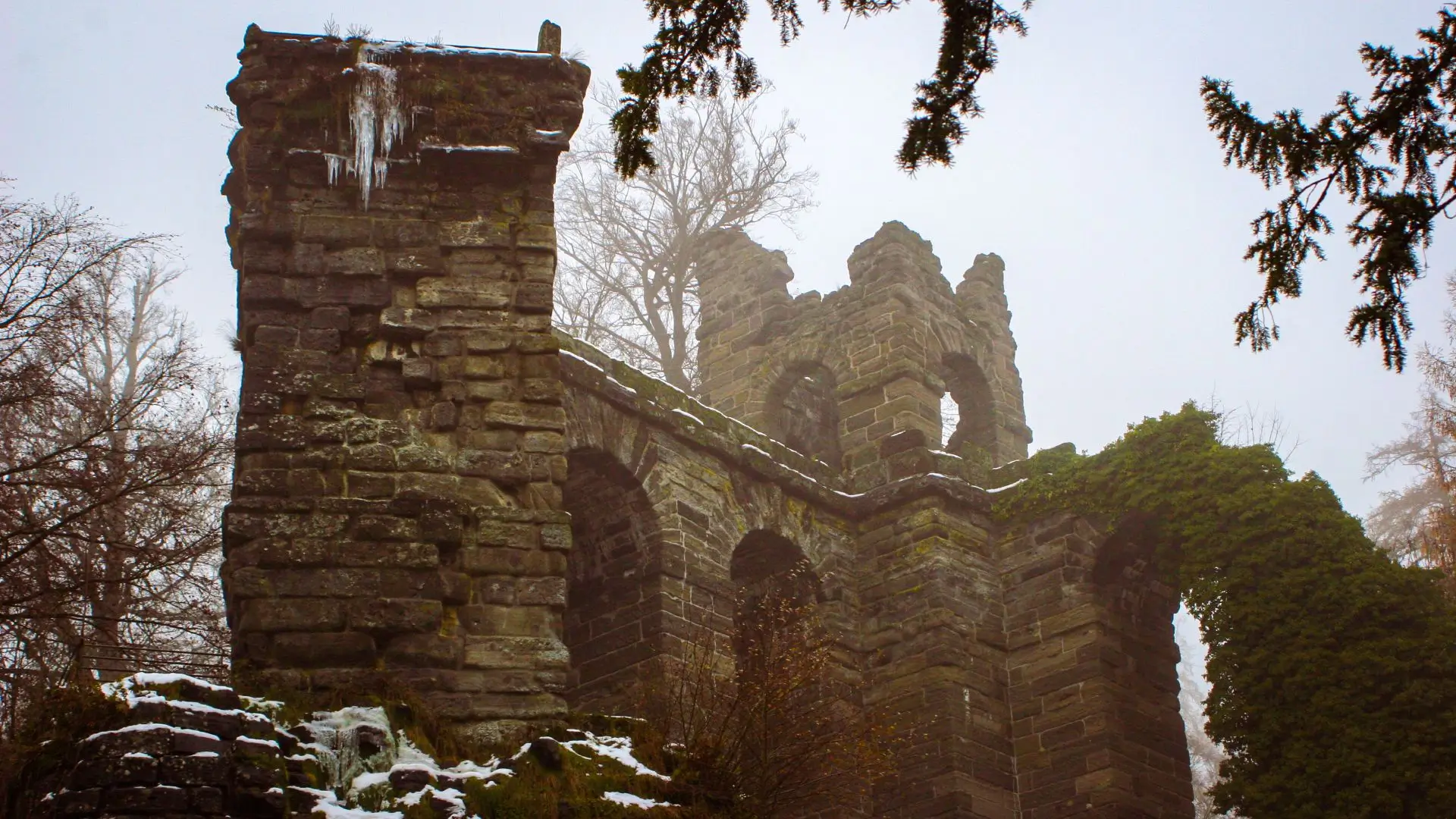 A photographic of the aqueduct at Bergpark Wilhemshöhe in Kassel, Germany, viewed in winter.